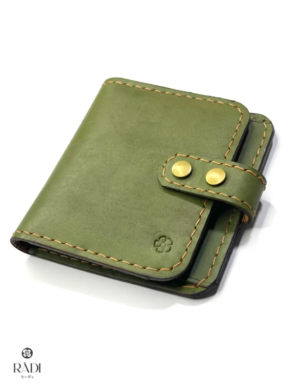 handmade full-grain leather bi-fold card wallet with dual-snap closure
